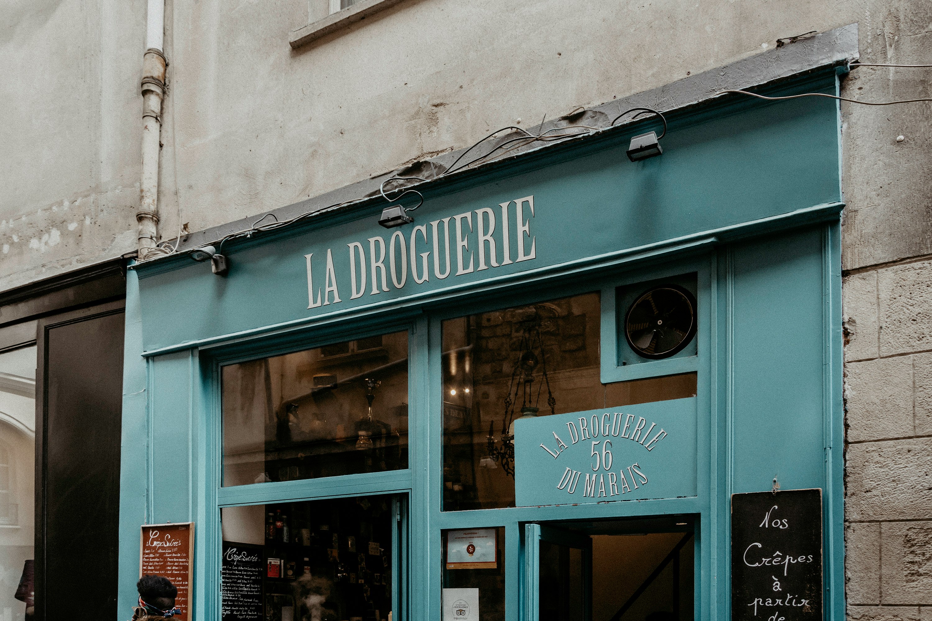 green and white store front